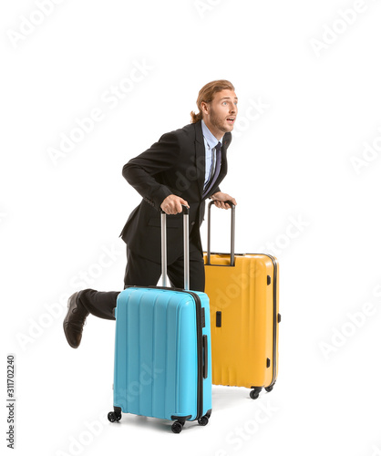 Hurrying businessman with l...