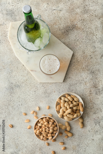 Fresh beer and snacks on table