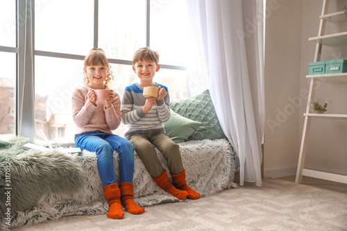 Happy young children enjoyi...
