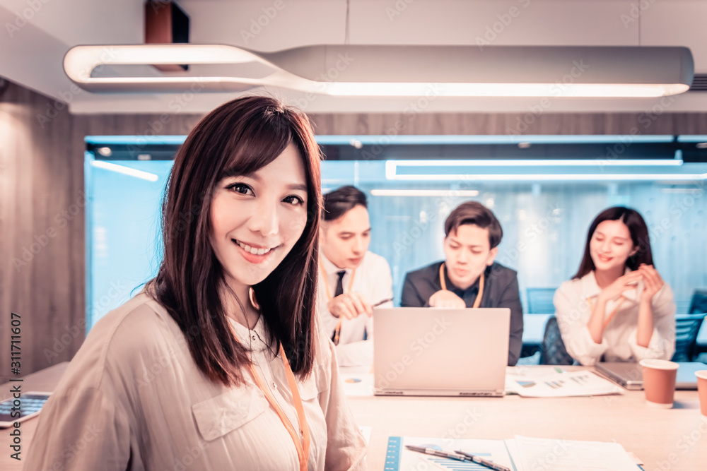 young business woman working with her staff in office young business woman working with her staff in office
