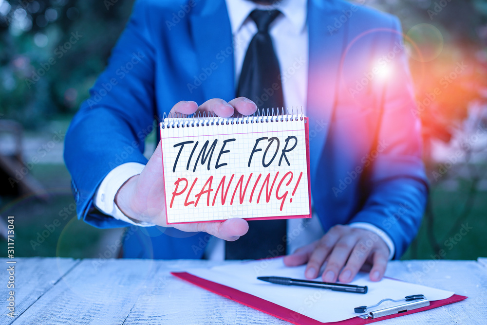 Obraz premium Conceptual hand writing showing Time For Planning. Concept meaning exercising conscious control spent on specific activities Man holds empty paper with copy space in front of him
