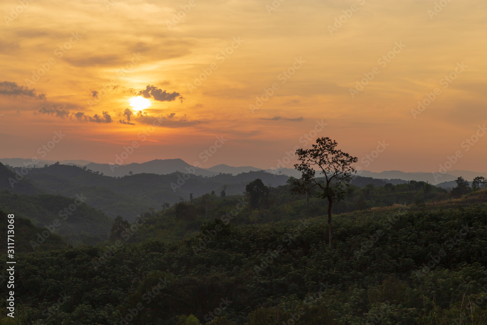 Sunset above mountain on morning. View from the mountain. Mountain landscape during sunset.