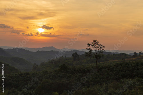 Sunset above mountain on morning. View from the mountain. Mountain landscape during sunset.