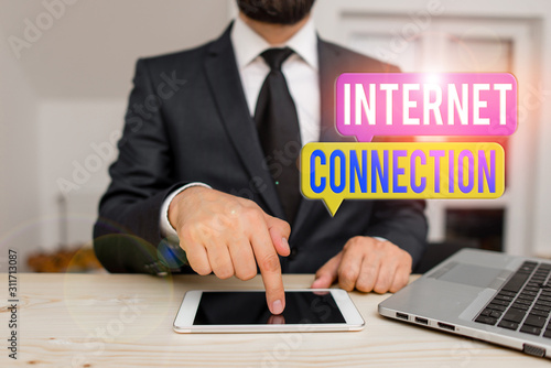 Word writing text Internet Connection. Business photo showcasing The way one gains access or connection to the Internet Male human wear formal clothes present presentation use hi tech smartphone photo