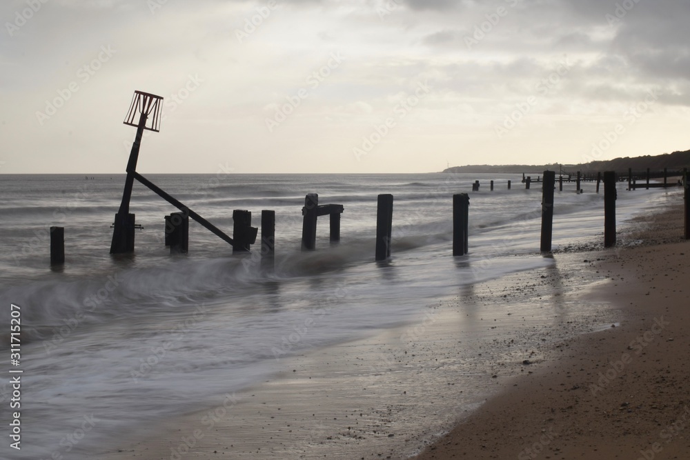 Long exposure photography of the choppy sea at Gorleston-on-sea beach, Norfolk, England, UK.