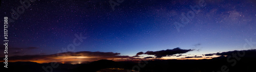 Starry sky is located above the picturesque views
