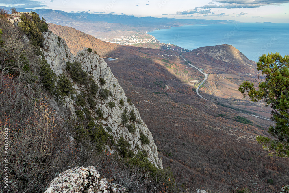 A beautiful seascape view from the top of Paragilmen Mountain on the southern coast of Crimea. Alushta and Mount Kastel in sight.