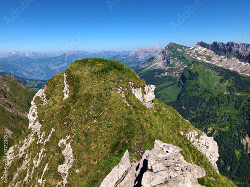 Alpine mountain peak Zindlenspitz above the Wagital valley or Waegital and Lake Wagitalersee (Waegitalersee), Innerthal - Canton of Schwyz, Switzerland photo