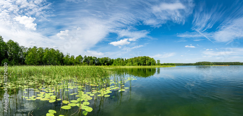 Fototapeta Panorama of beautiful summer day on masuria lake district in Poland