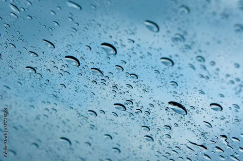Water drop on a glass during raining season