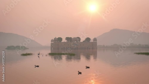 Tranquil morning at Jal Mahal Water Palace at sunrise in Jaipur. Rajasthan, India photo