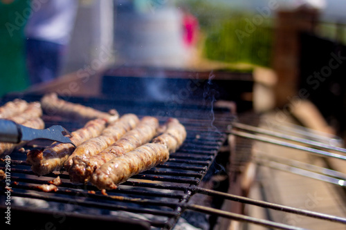 Barbecue - Grilling pork sasuages