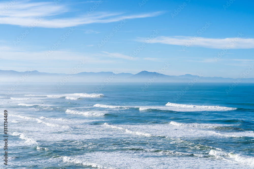 The ocean with waves in Biarritz. Christmas Day in the Basque Country of France.