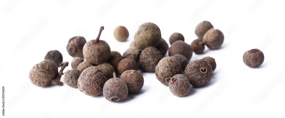 Heap of black pepper grains isolated on white Heap of black pepper grains isolated on white