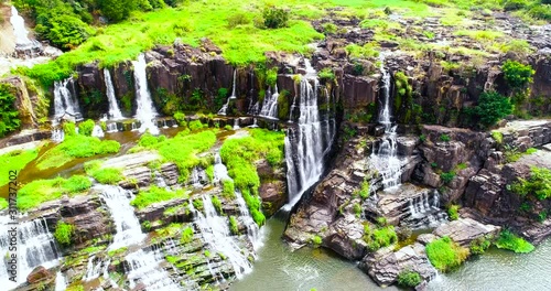 Aerial shooting of beautiful Pongour waterfall in Vietnam, Da lat city.Drone view for amazing vietnamese landscape. photo