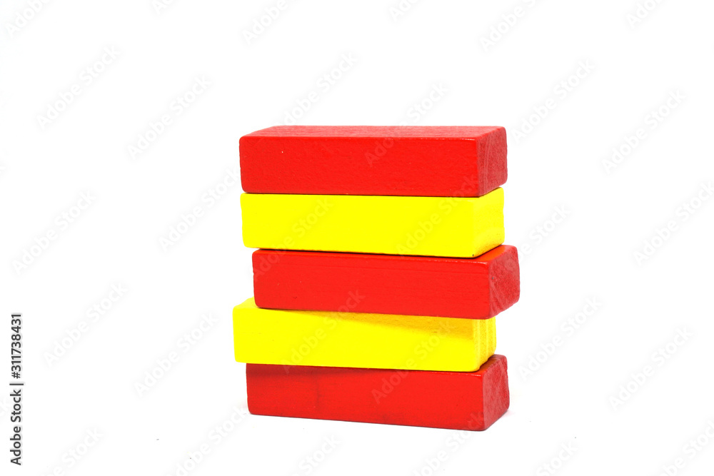 Wooden Kids Toys or jigsaw wooden for Develop children's skills arrange isolated on white background - red yellow color - Different - separate Concept Wooden Kids Toys or jigsaw wooden for Develop children's skills arrange isolated on white background - red yellow color - Different - separate Concept