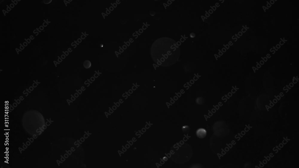 particles on black background, abstract overlay with particles and bokeh