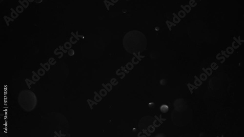 particles on black background, abstract overlay with particles and bokeh