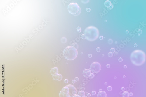 Soap bubbles on pastel natural rainbow background