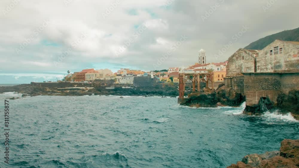 Old loading dock of Garachico, village in the north of Tenerife. The concept of tourism and travel, Canary Islands Spain. Old loading dock of Garachico, village in the north of Tenerife. The concept of tourism and travel, Canary Islands Spain.