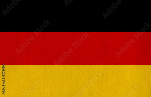 National flag of Germany on a cotton texture background