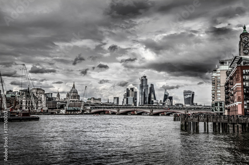 Cityscape from tower bridge in dramatic style, London