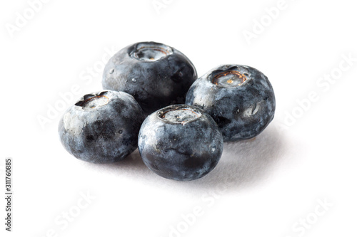 Freshly picked blueberries on isolated background.