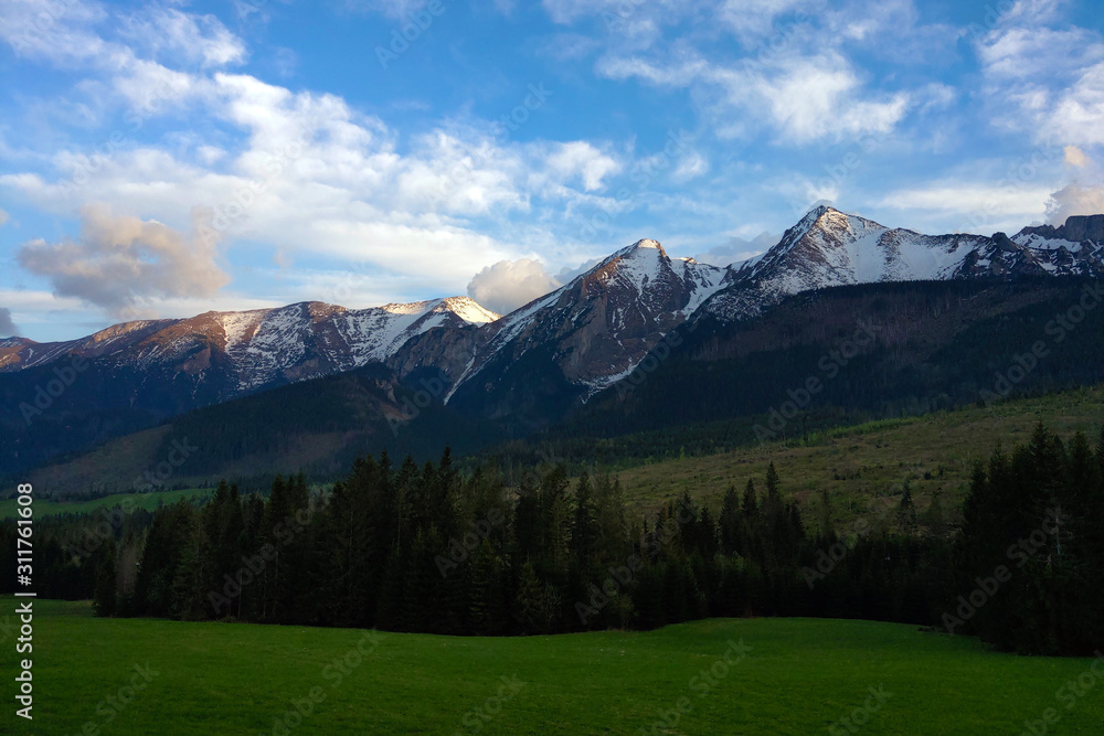 View of mountain peaks in spring time in High Tatras.
