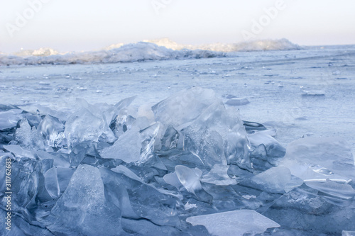 Shards of frozen river ice.