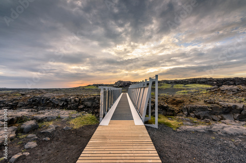 Midlina Bridge bridges the gap between the continental drift of Europe and North America, Sandvic, Reykjanes Peninsula, Iceland photo