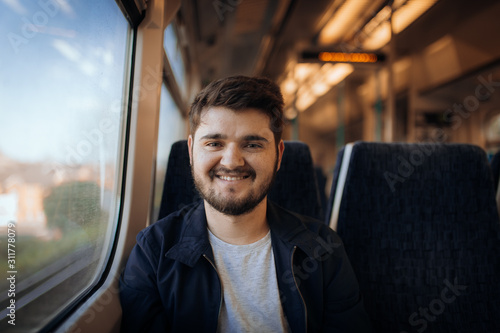 Man smiling inside the wagon