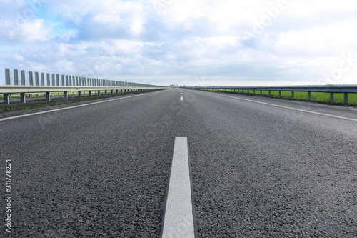 Beautiful view of asphalt highway without transport