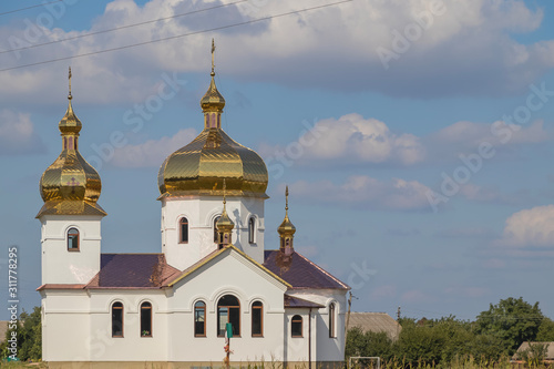 God's new brick temple with a bell tower