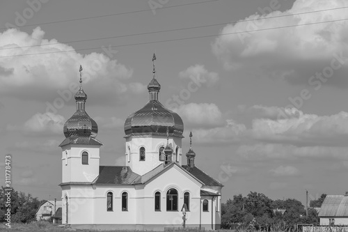God's new brick temple with a bell tower