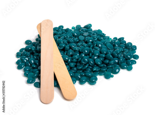 spa wax for depilation in granular form on the white background photo