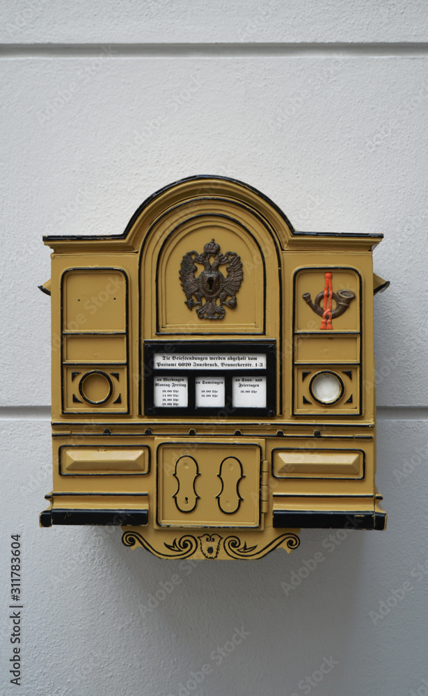 Gelber nostalgischer Briefkasten an Hauswand in Österreich /Nostalgic post  box Stock Photo | Adobe Stock
