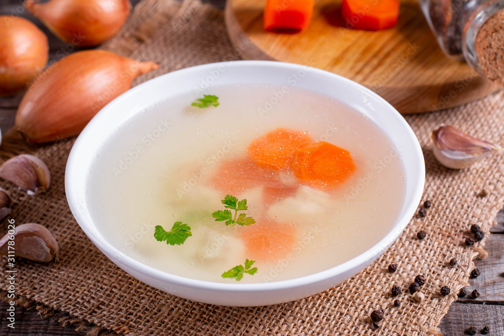 Fresh fish broth. Fish soup with ingredients and spices for cooking Fresh fish broth. Fish soup with ingredients and spices for cooking
