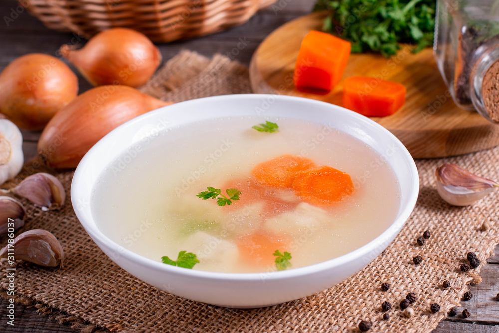 Fresh fish broth. Fish soup with ingredients and spices for cooking Fresh fish broth. Fish soup with ingredients and spices for cooking