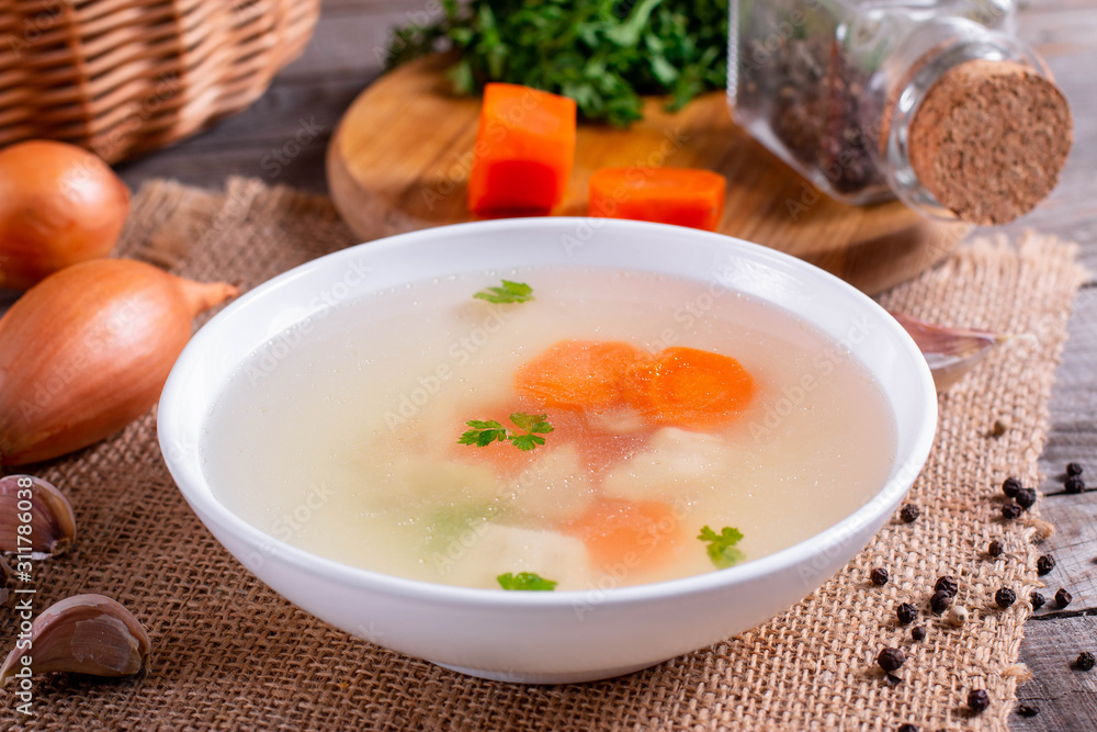 Fresh fish broth. Fish soup with ingredients and spices for cooking Fresh fish broth. Fish soup with ingredients and spices for cooking
