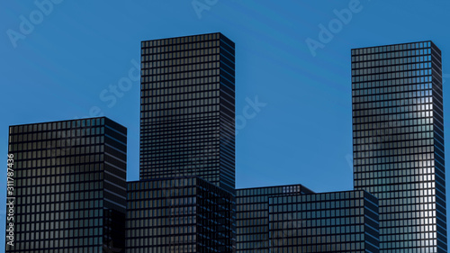 Panoramic and perspectiveview to steel light blue background of glass high rise building skyscraper city of future. Business concept of industry tech architecture. 3d rendering. 3d illustration