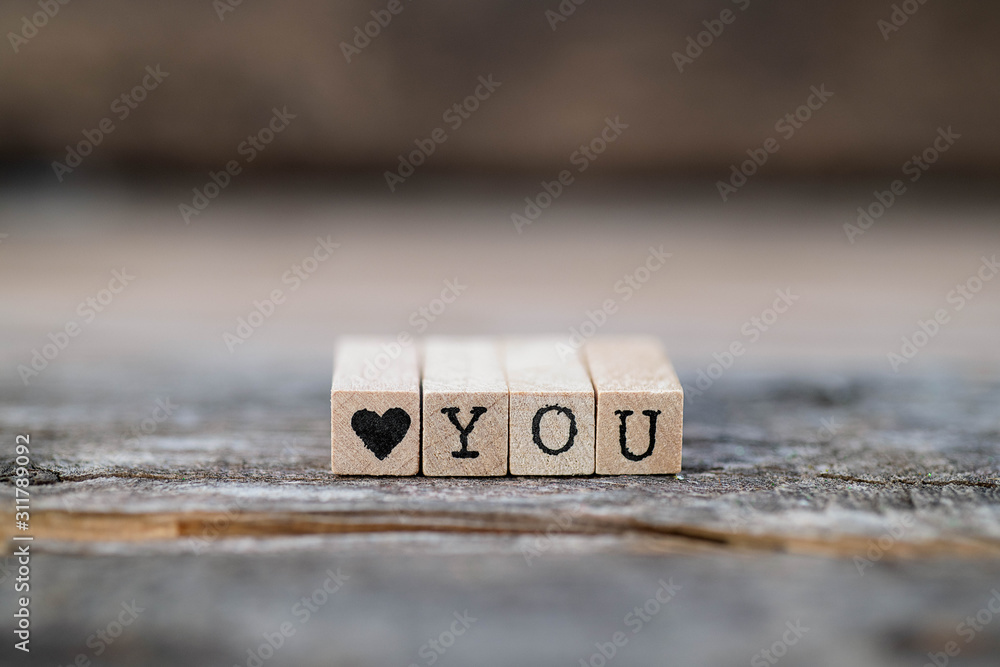 Heart YOU on a wooden background Heart YOU on a wooden background