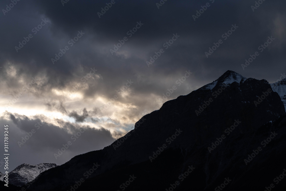 Dark mountain range on a cloudy day Dark mountain range on a cloudy day