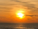 Couché de soleil sur la plage de Costa da Caparica, Portugal 