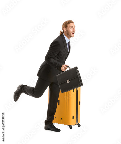 Hurrying businessman with l...