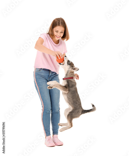 Cute teenage girl playing w...
