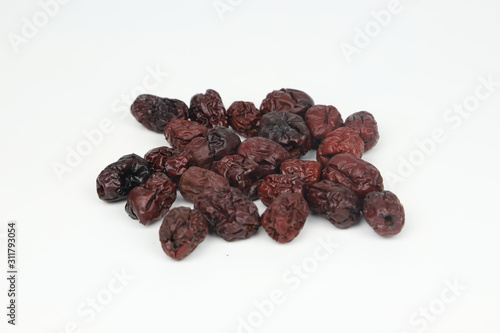 Dried Red Jujube Fruit (Dried Red Dates) on white background