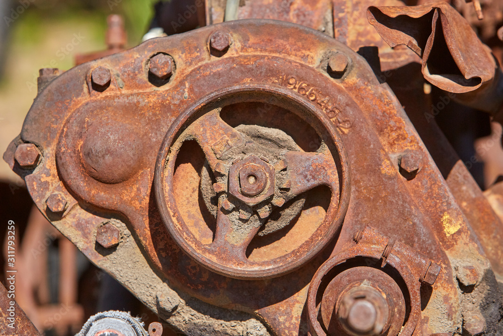 Still life photo of rusty metal cog from an old iron industrial gear