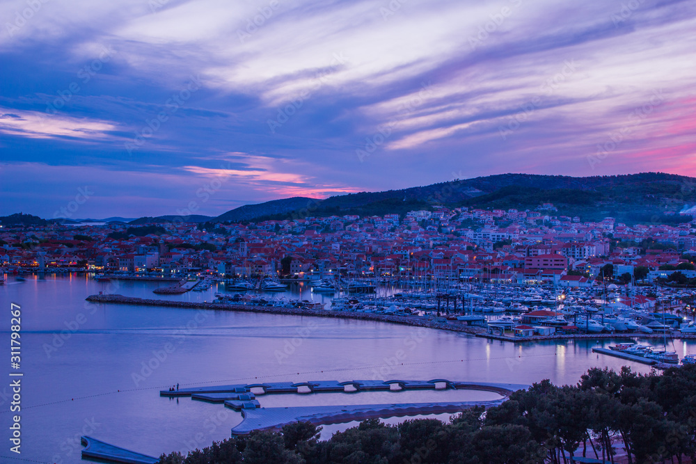 Vodice, Croatia / 17th May 2019: Sunset in Vodice, blue hour seafront aerial view