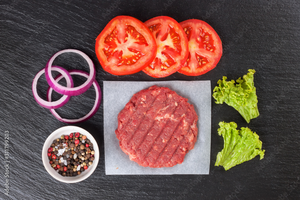 raw home-made beef burger cutlet. burger ingredients raw home-made beef burger cutlet. burger ingredients