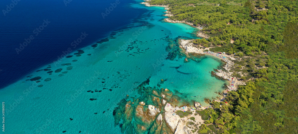 Aerial drone ultra wide photo of beautiful exotic paradise rocky turquoise beach in Caribbean island destination